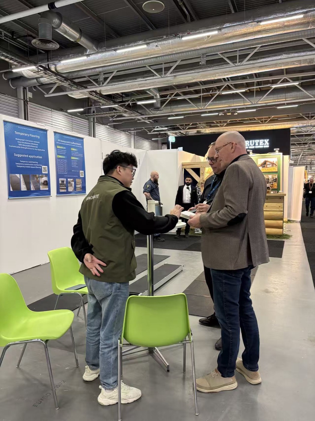 HOTECH team discussing projects with buyers