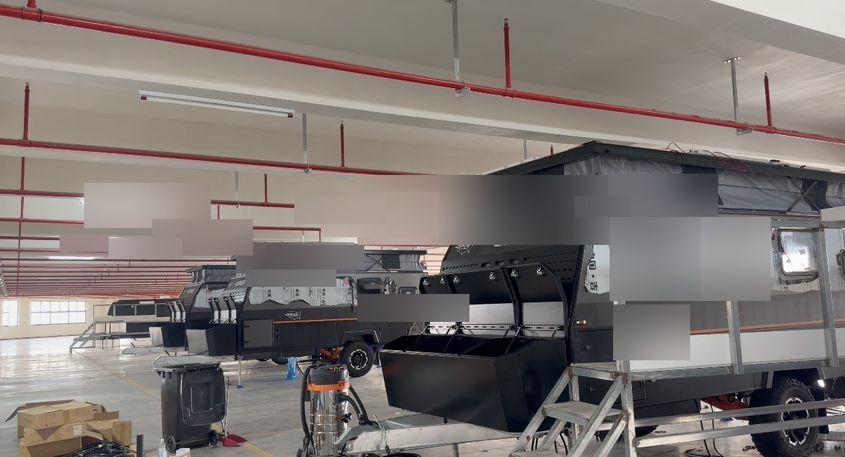 Camper trailer bodies on the assembly line