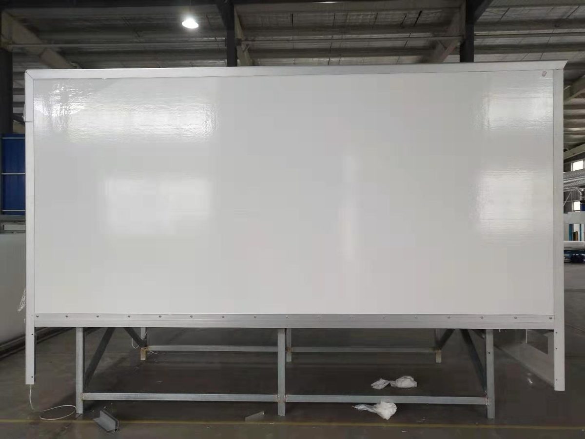 Dry freight body side panel close-up — smooth white PP honeycomb finish