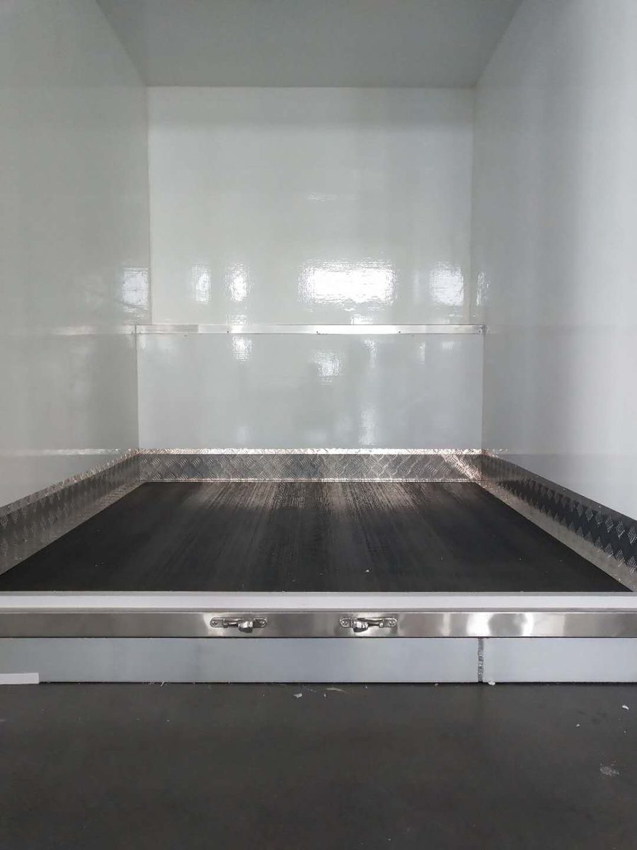 Reefer truck body interior — anti-slip CFRT floor, white insulated walls